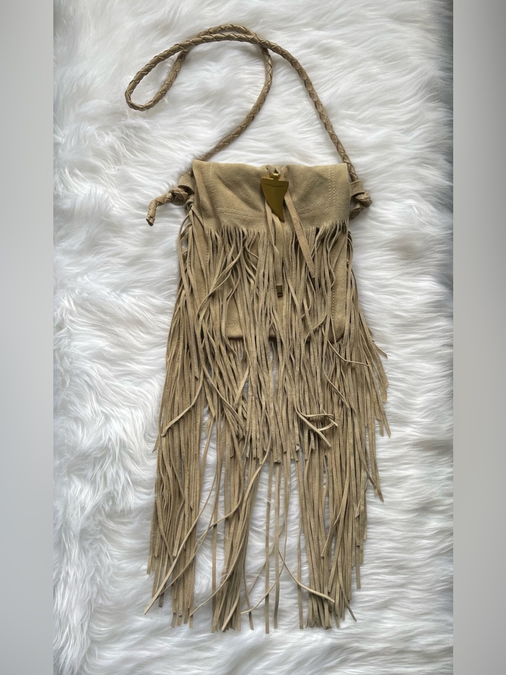 Suede bag with dramatic fringe
